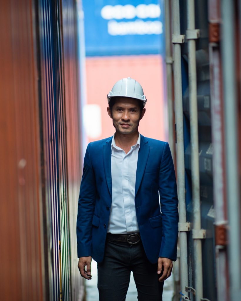 portrait-of-foreman-worker-standing-at-container-cargo-harbor-to-loading-containers.jpg